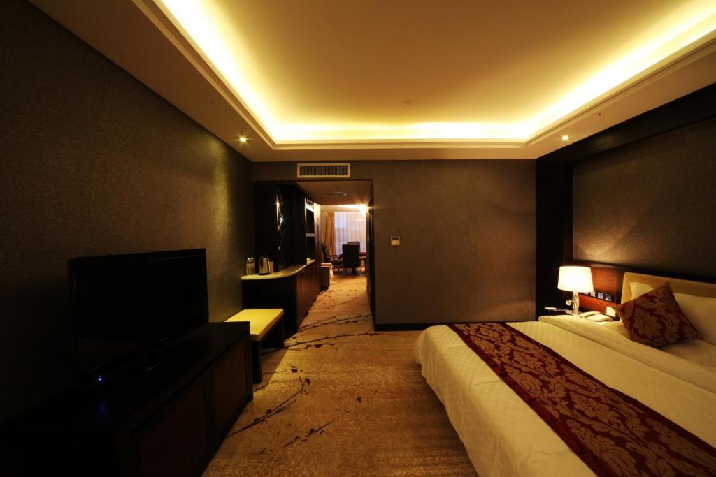 Xiongzhao Grand Hotel Weishan Дали Номер фото